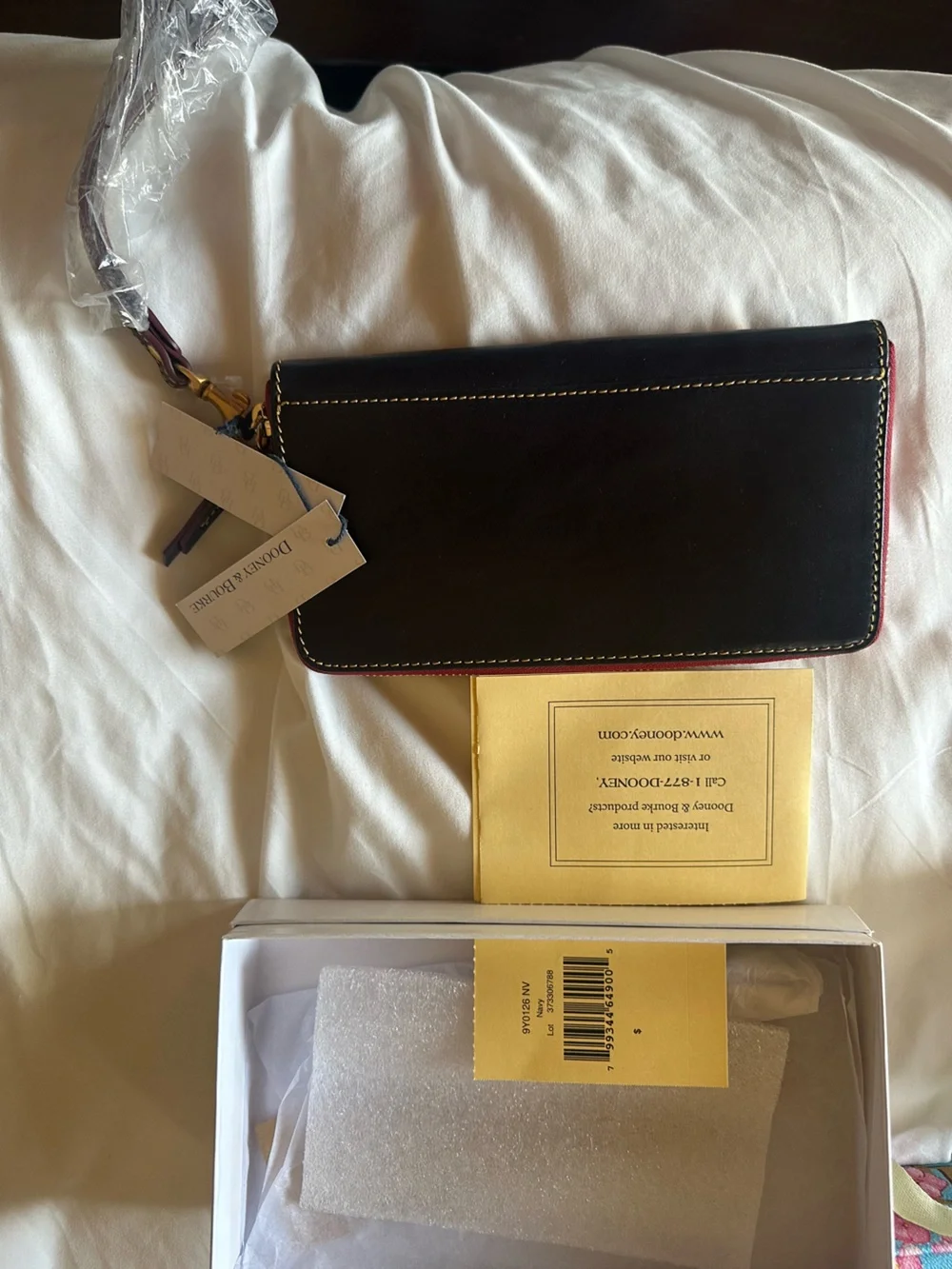 Dooney & Bourke Navy Florentine Leather Zip wallet with Red Trim